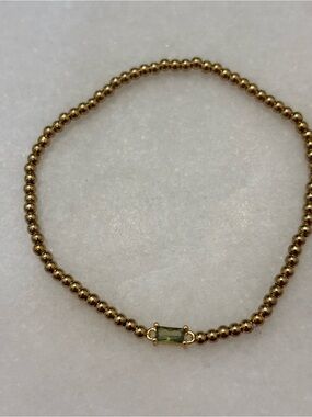 Gold Bead Stretch Bracelet with Green Rectangular Stone - August birthstone